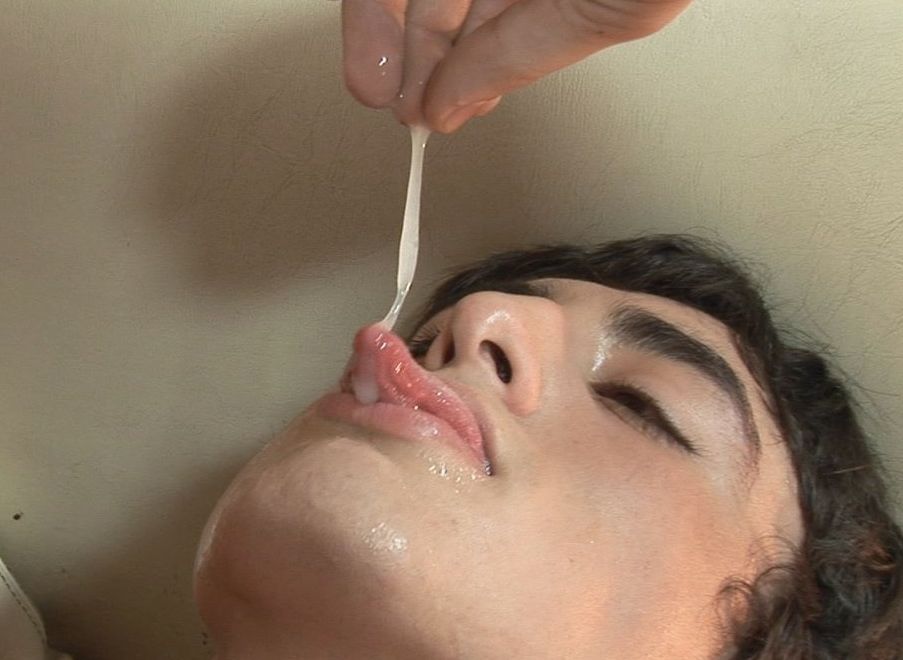 Slutty young twink eating cum