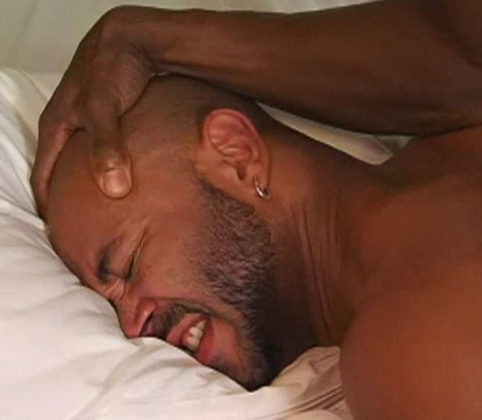 Bearded black stud pinned down while taking cock