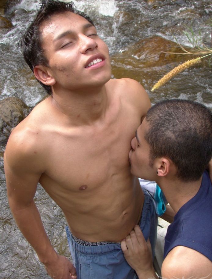 Young little Latino gets his nipple sucked in the middle of a stream