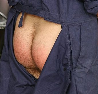 Guy with a ripped union suit showing off his hot, fuckable ass