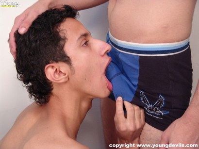 Latin twink licks his buddy's cock through his underwear